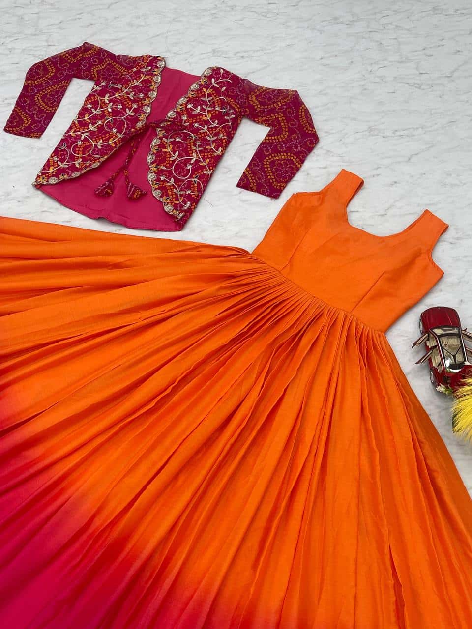 Designer silk gown with bandhej jacket for wedding wear