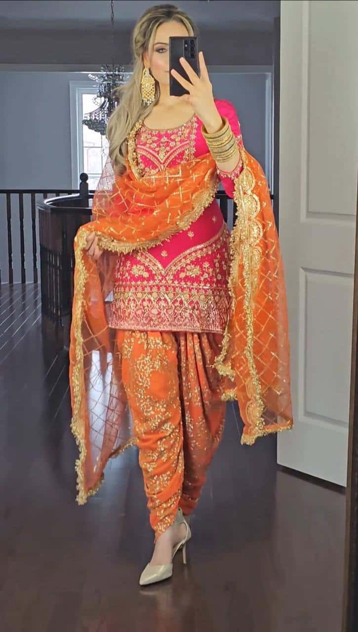 Beautiful faux georgette orange and green punjabi dhoti set
