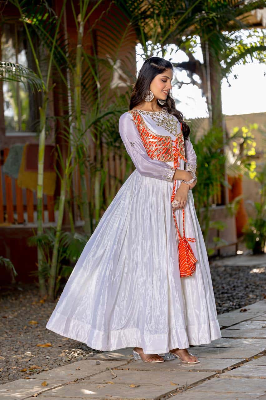 Pure Chinon and Laheriya Print gotta pati gown with attached jacket with matching hand purse