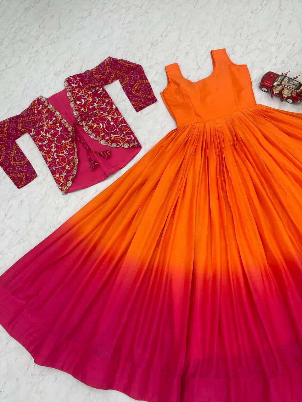 Designer silk gown with bandhej jacket for wedding wear