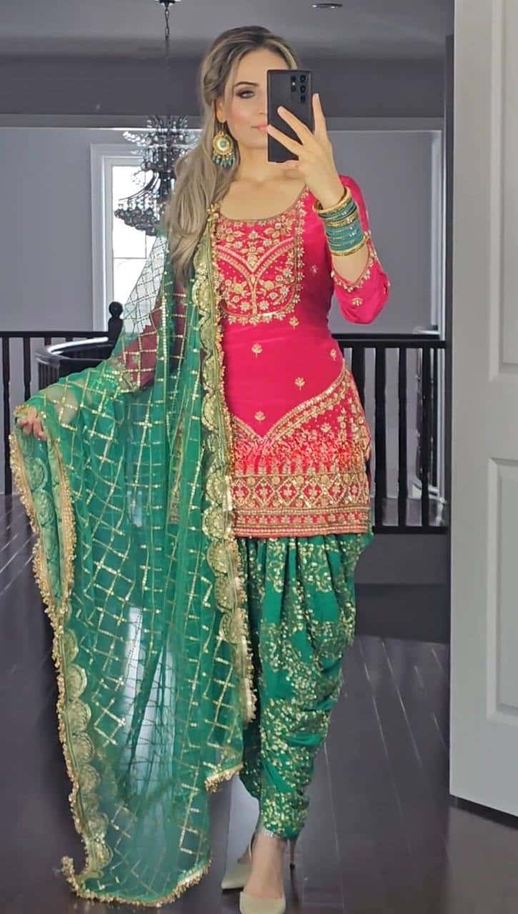 Beautiful faux georgette orange and green punjabi dhoti set