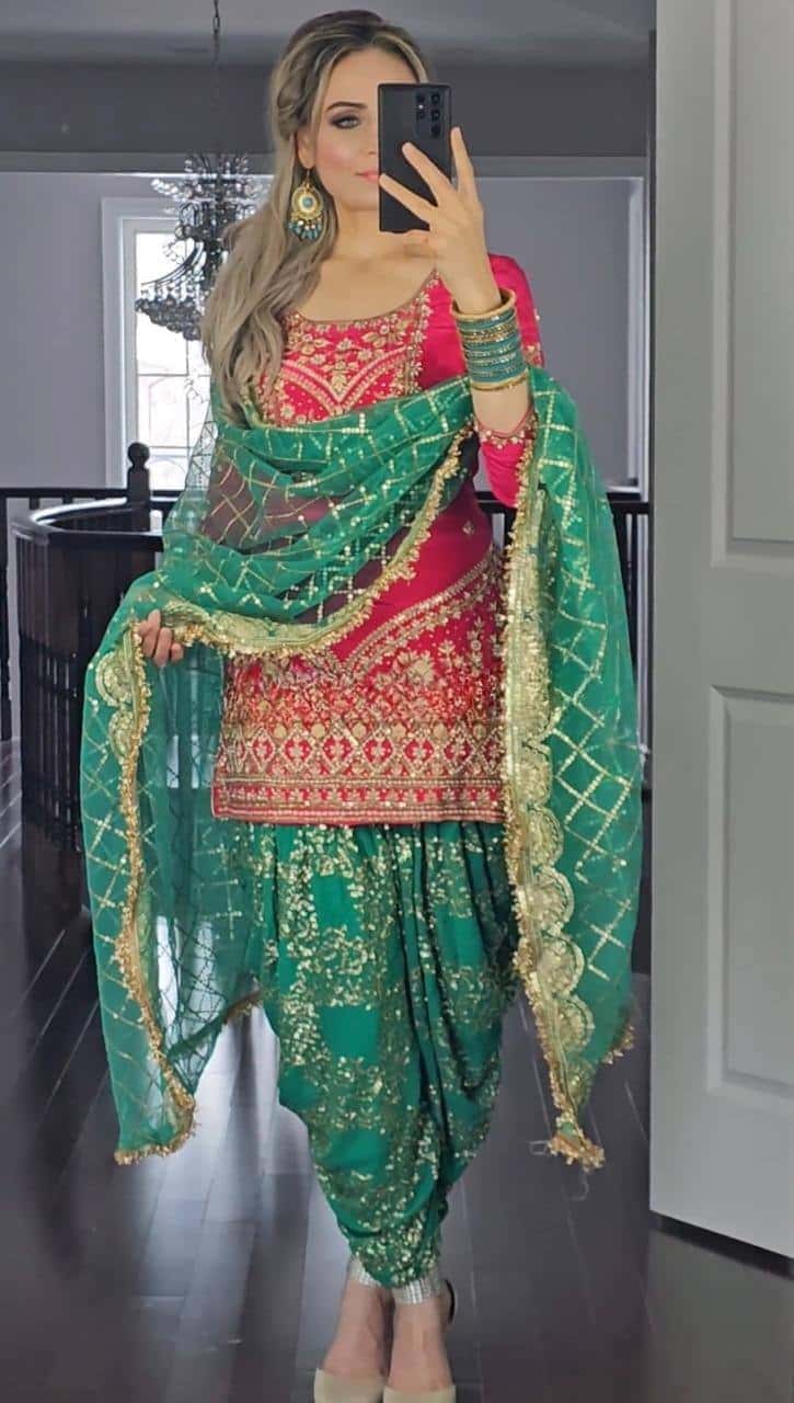Beautiful faux georgette orange and green punjabi dhoti set