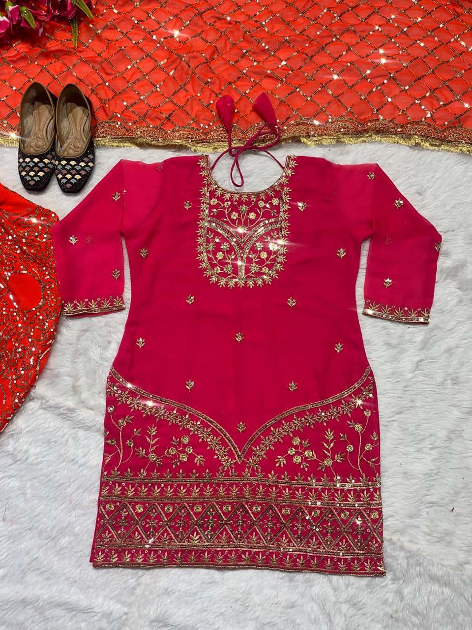 Beautiful faux georgette orange and green punjabi dhoti set