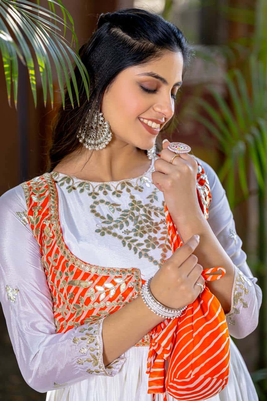 Pure Chinon and Laheriya Print gotta pati gown with attached jacket with matching hand purse