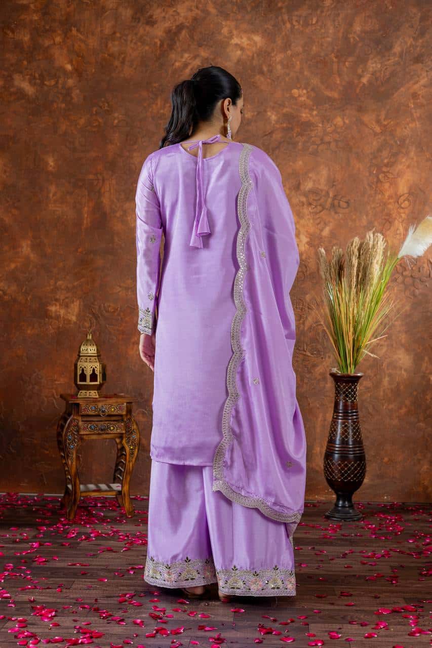 "Festive Embroidered Chinon Silk Ensemble with Tassels and Cutwork Dupatta"