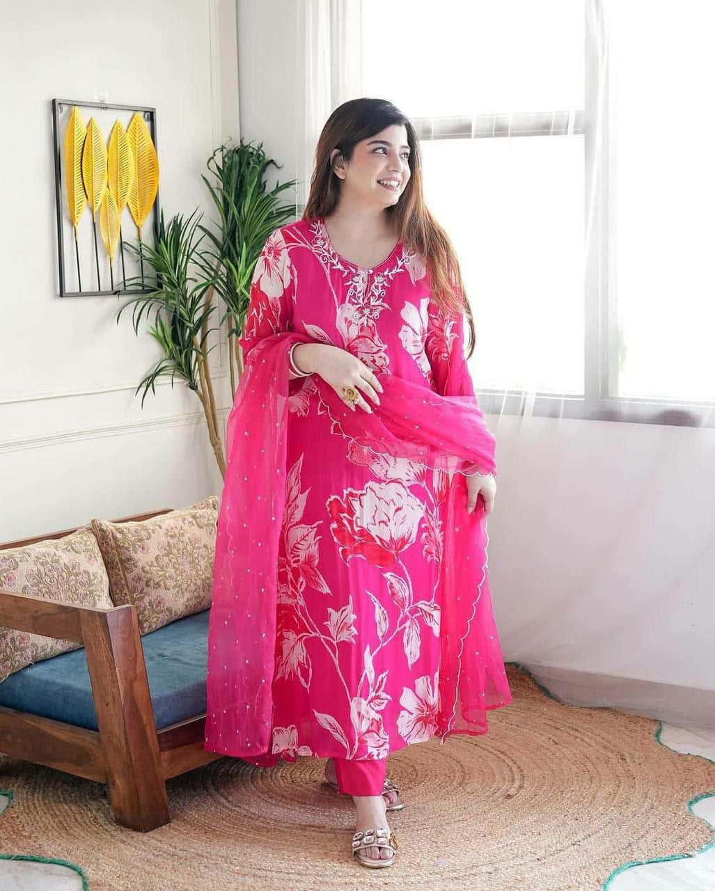 "Elegant Fuchsia Net Dress for Festive Occasions"