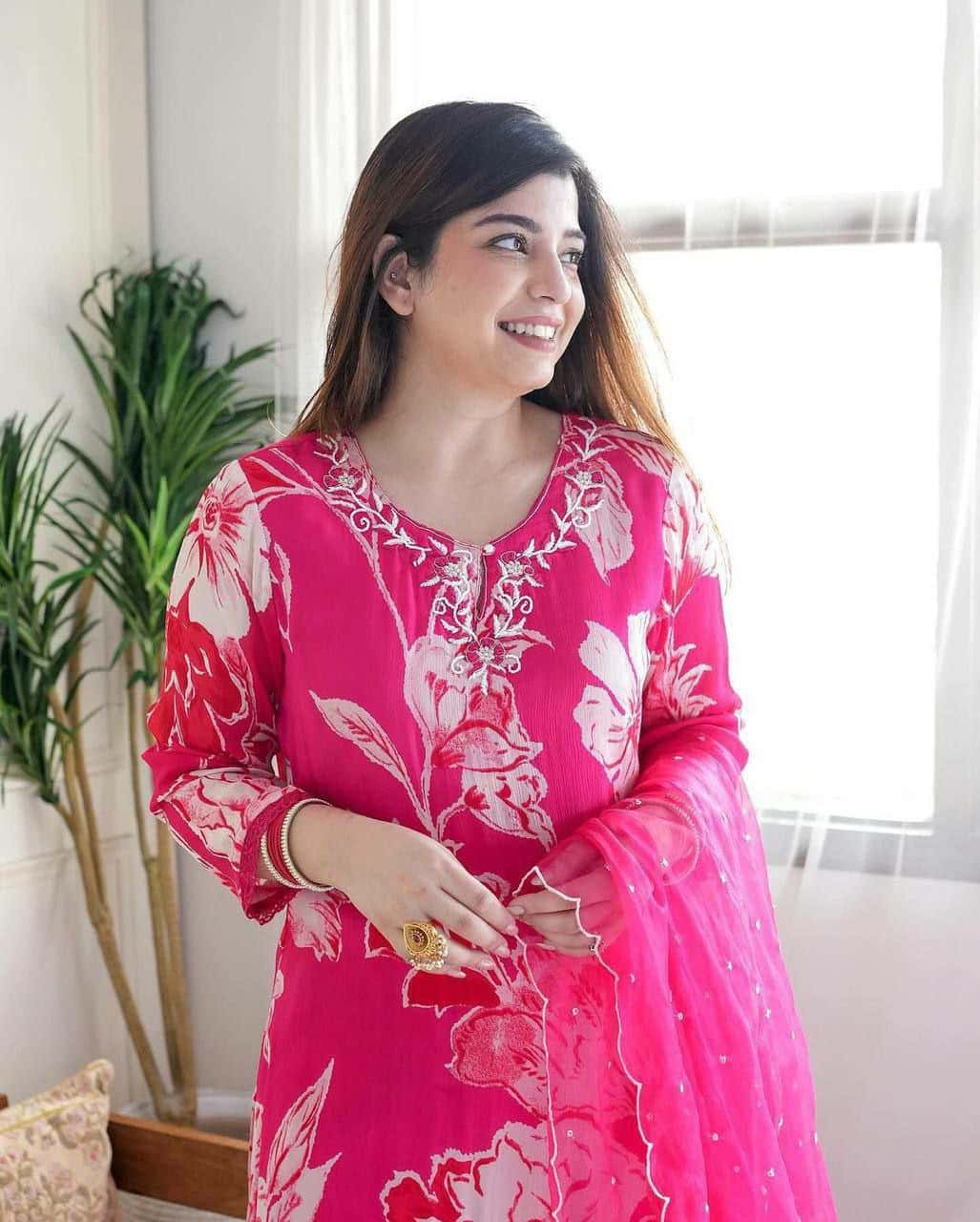 "Elegant Fuchsia Net Dress for Festive Occasions"